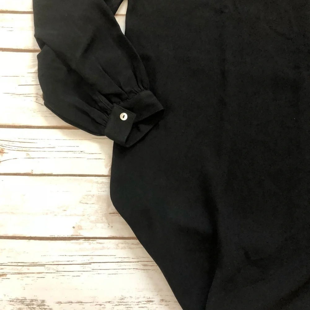 Reyna Couture black blousant sleeve dress